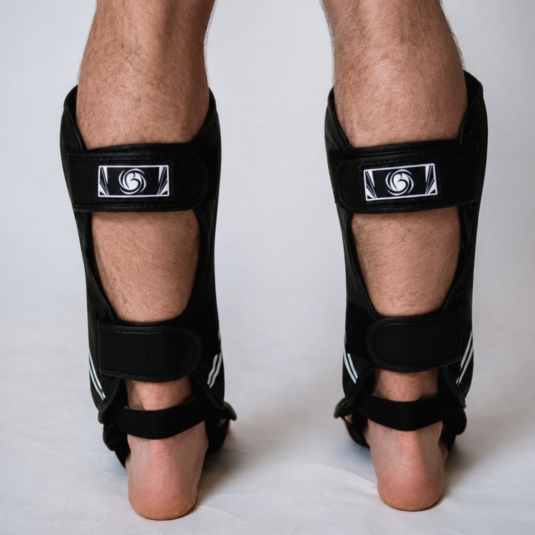 Black/White Bytomic Axis V2 Shin Instep Guards