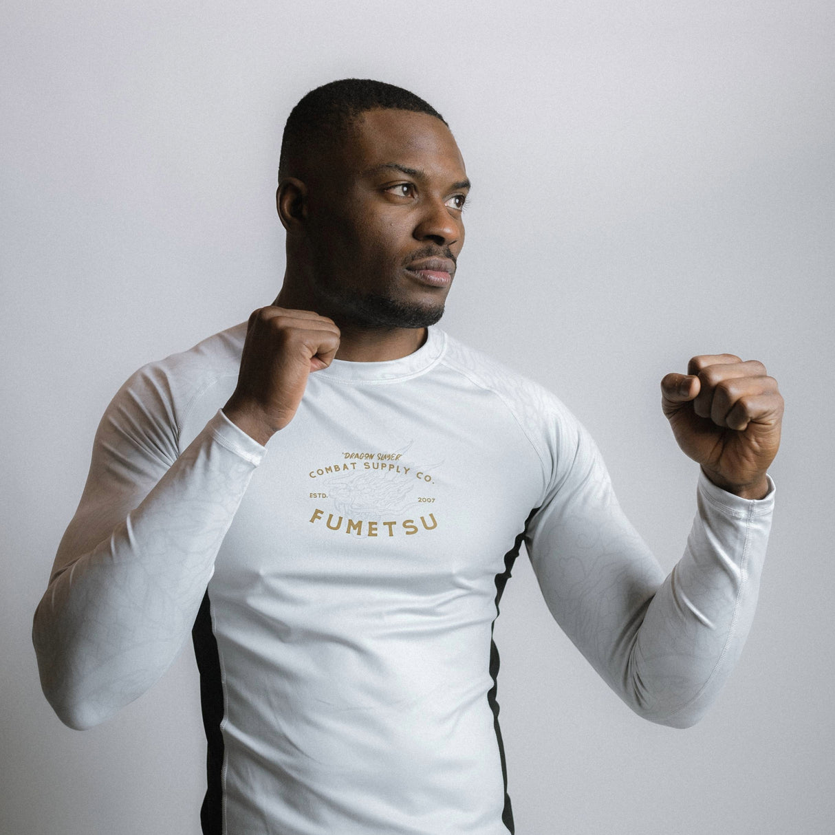 Fumetsu Dragon Slayer Long Sleeve Rash Guard White/Black/Gold