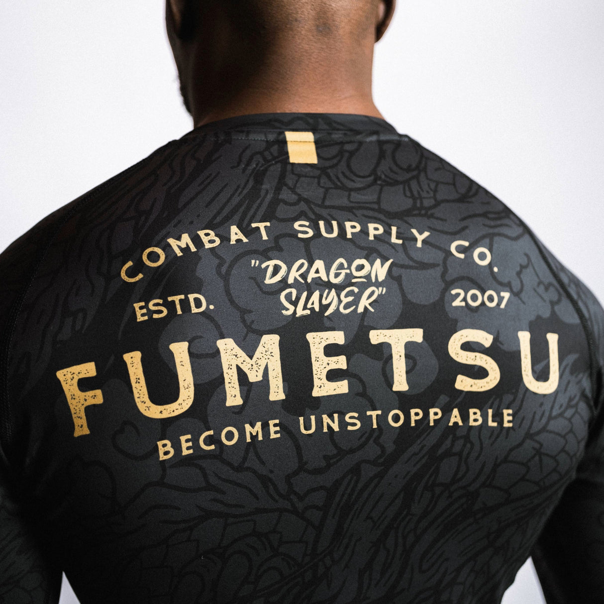 Fumetsu Dragon Slayer Long Sleeve Rash Guard Black/Gold