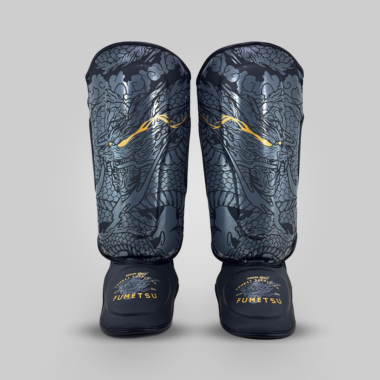 Fumetsu Dragon Slayer Shin Guards Black/Gold