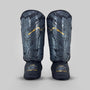 Fumetsu Dragon Slayer Shin Guards Black/Gold