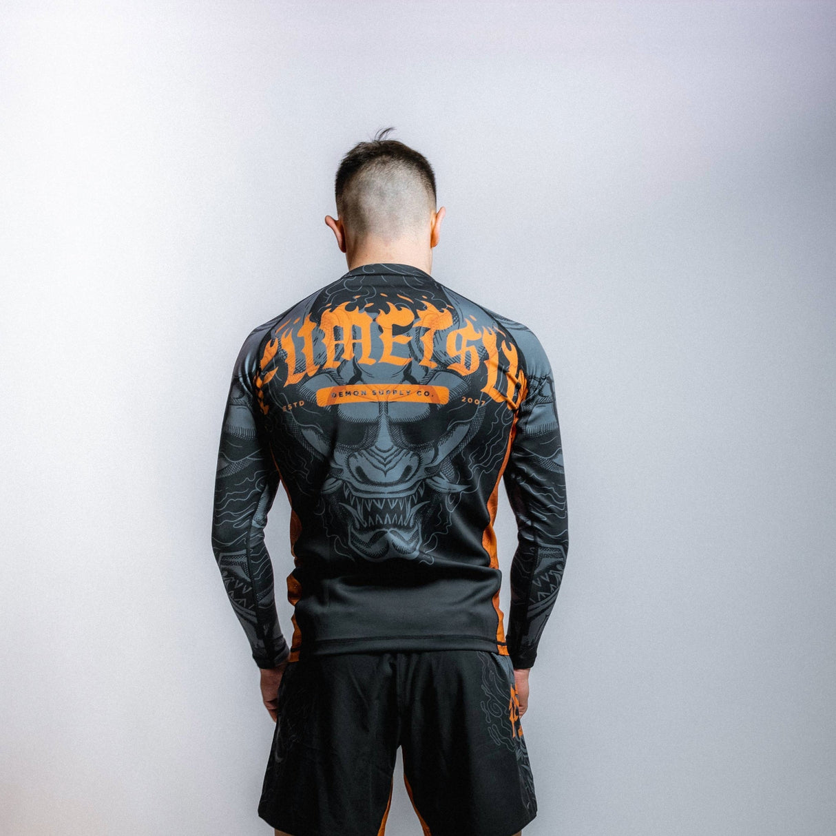 Fumetsu Oni Long Sleeve Rash Guard Black/Grey/Bronze