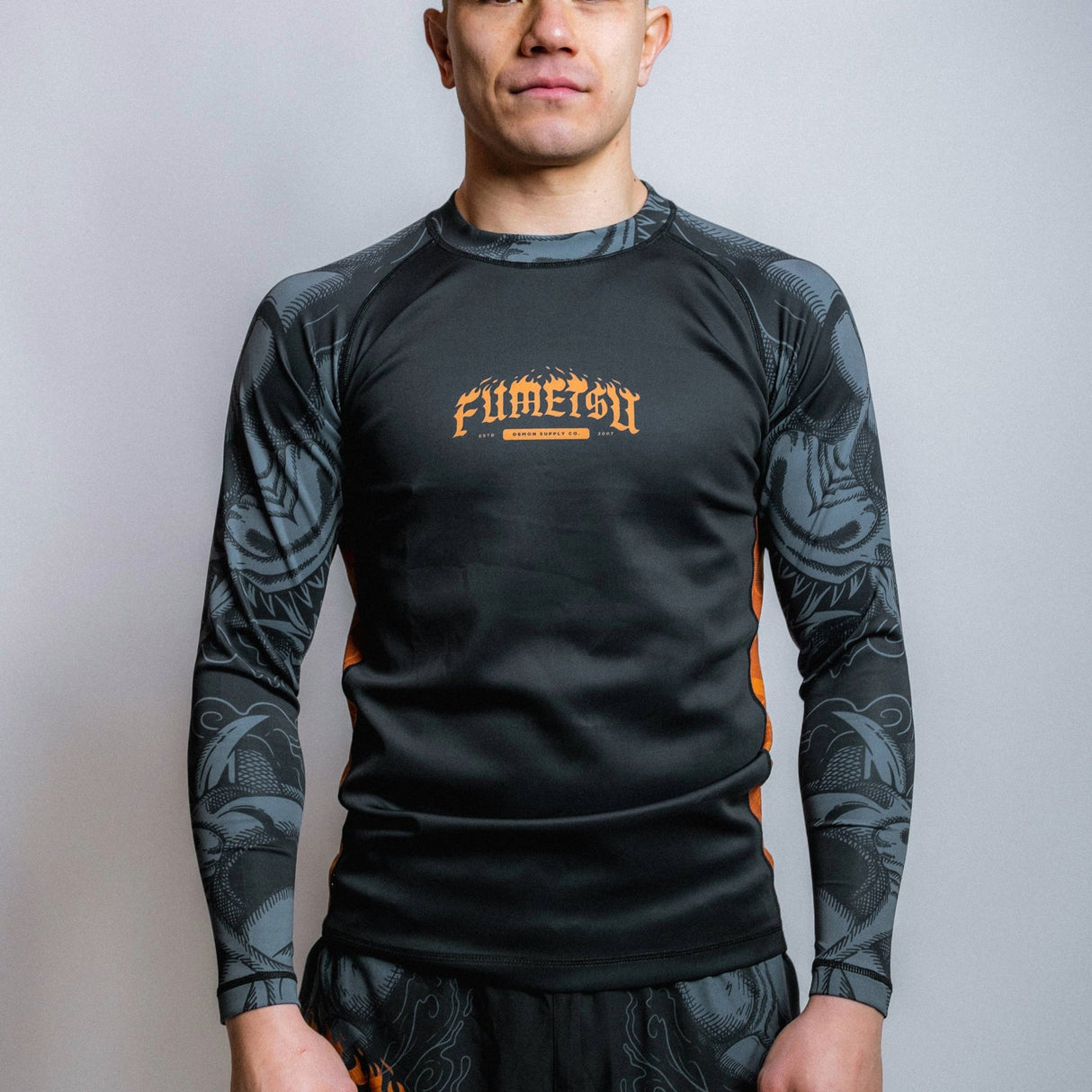 Fumetsu Oni Long Sleeve Rash Guard Black/Grey/Bronze