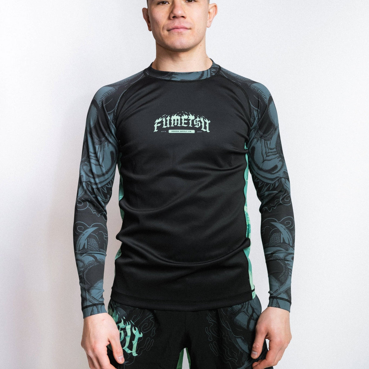 Fumetsu Oni Long Sleeve Rash Guard Black/Blue/Mint