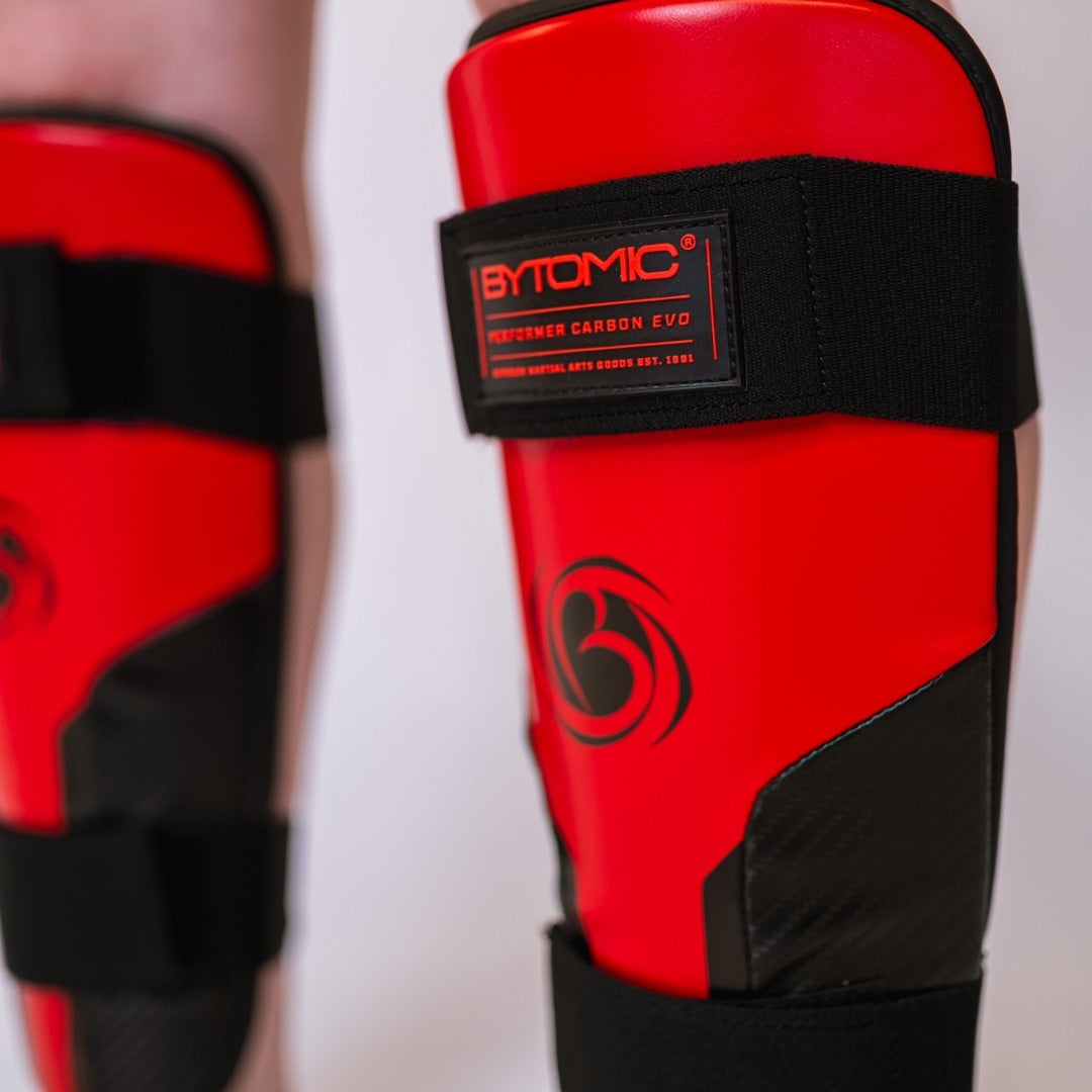 Red/Black Bytomic Performer Carbon Evo Shin Guards