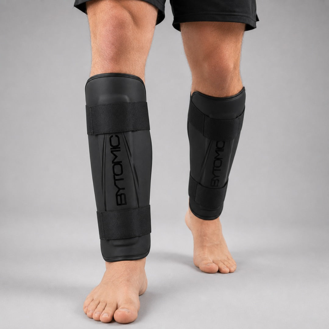 Black/Black Bytomic Axis V2 Shin Guards Lifestyle 4