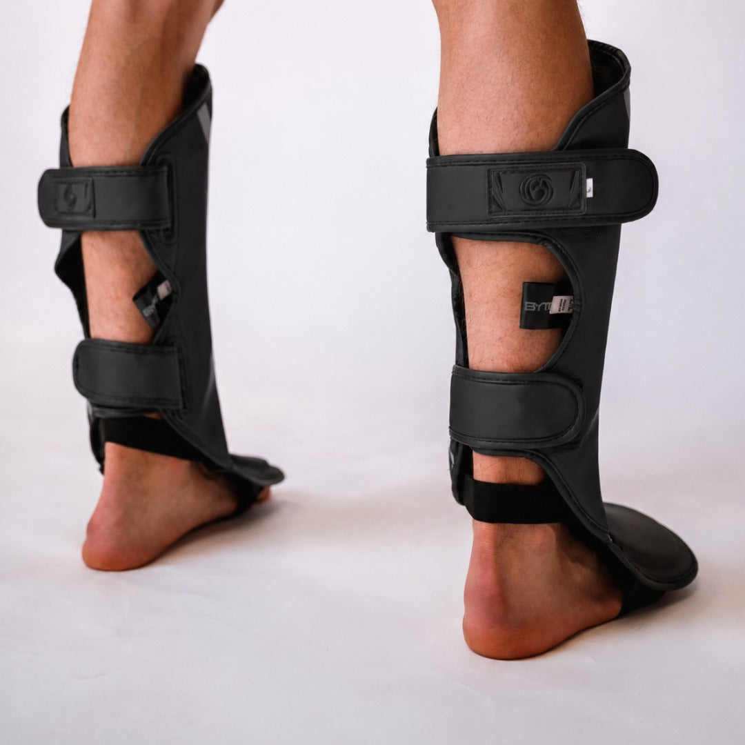 Black/Black Bytomic Axis V2 Shin Instep Guards
