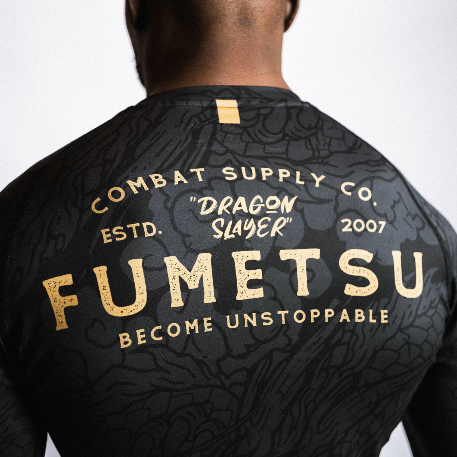 Fumetsu Dragon Slayer Long Sleeve Rash Guard Black/Gold