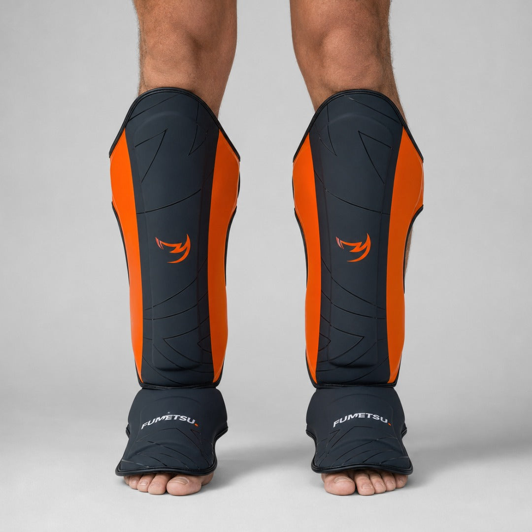 Fumetsu Icon Thai Shin Guards Black/Orange Lifestyle 1
