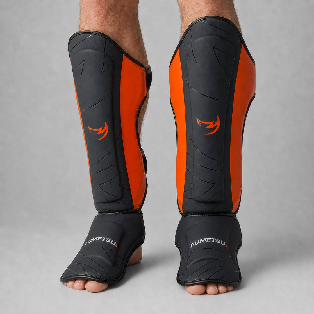 Fumetsu Icon Thai Shin Guards Black/Orange Lifestyle 2