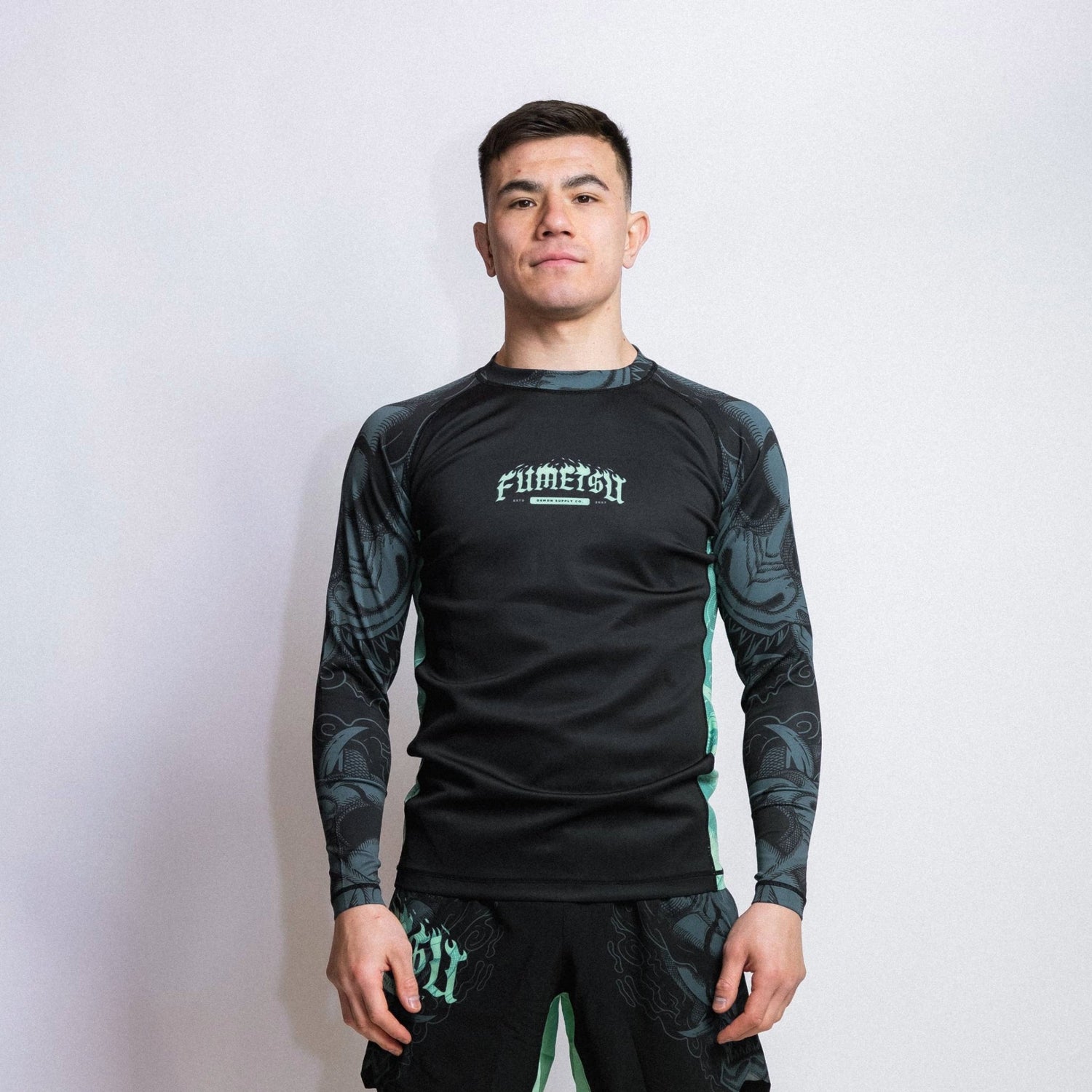 Fumetsu Oni Long Sleeve Rash Guard Black/Blue/Mint